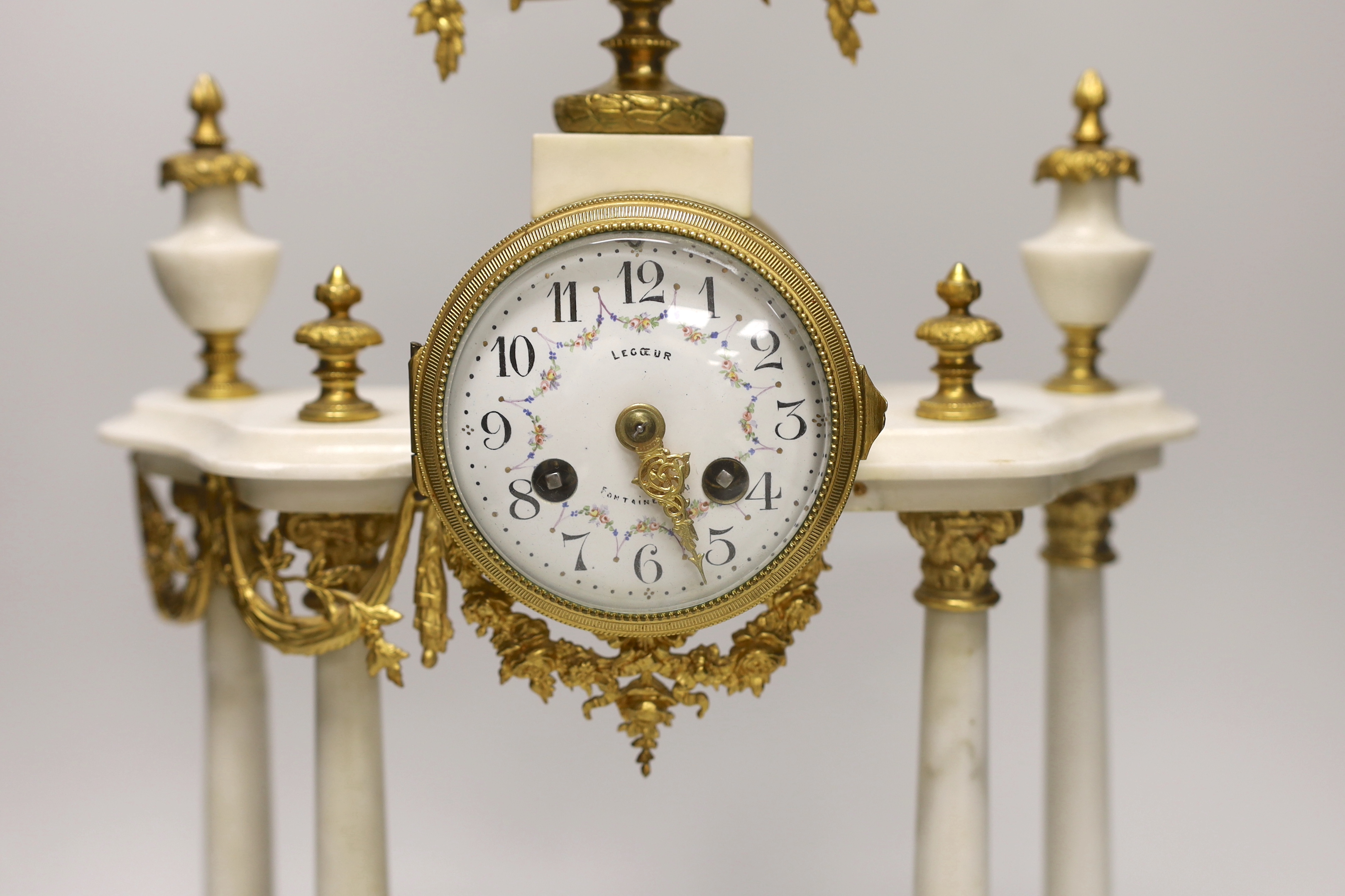A 19th century French white marble mantel clock, 42cm